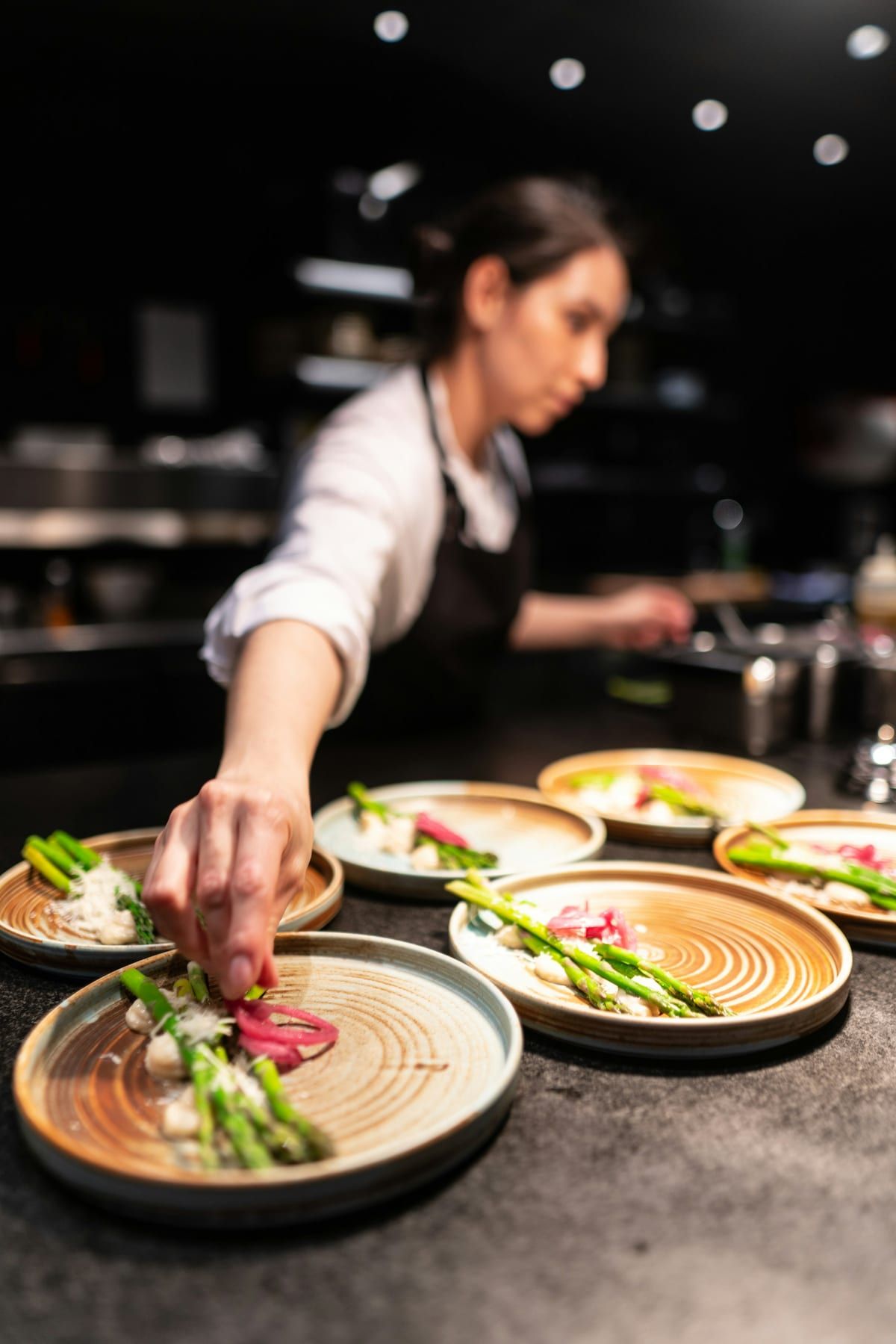 Chef Elena Voss in the North & Pine kitchen